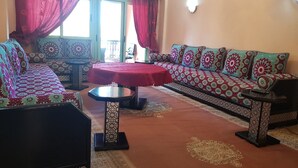 Family Apartment | Living room | 32-inch LCD TV with satellite channels, TV - Mirador Majorel (Marrakech)
