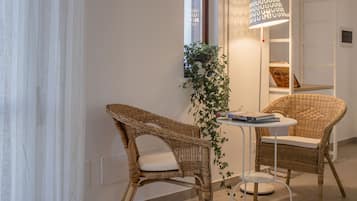 Luxury Quadruple Room, 2 Bedrooms, Balcony, Garden View | In-room dining