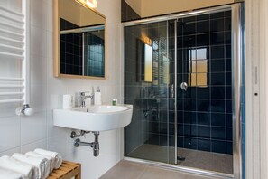 Deluxe Double Room (Adults Only) | Bathroom | Shower, free toiletries, hair dryer, bathrobes - Mondello Martini (Palermo)