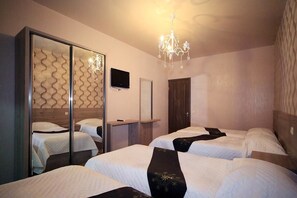 Chambre Quadruple Deluxe