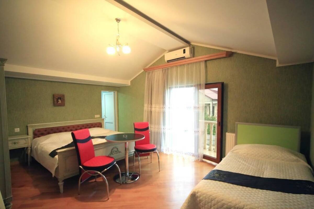Chambre Triple, balcon