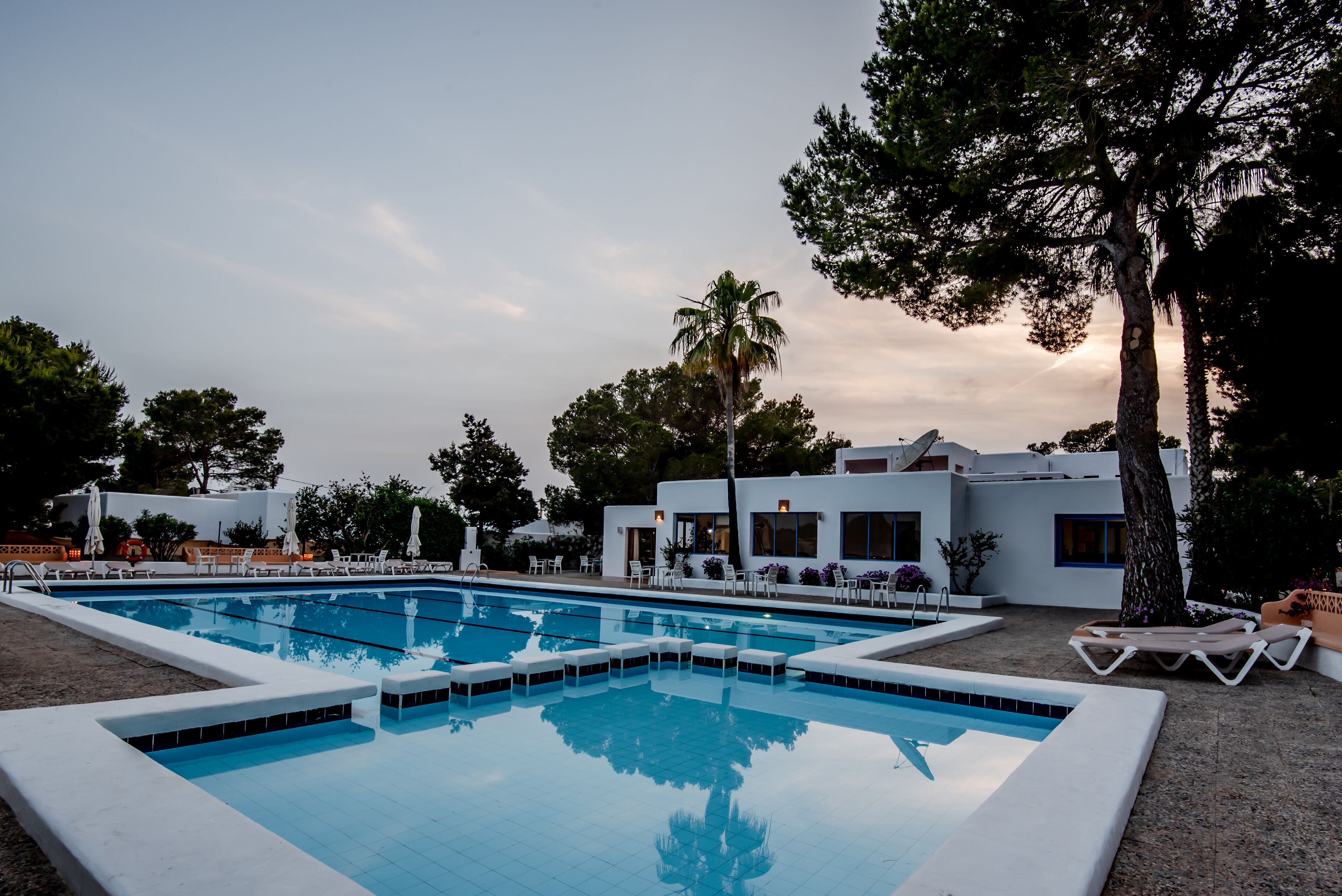 Seasonal outdoor pool, open 8:00 AM to 9:00 PM, pool umbrellas