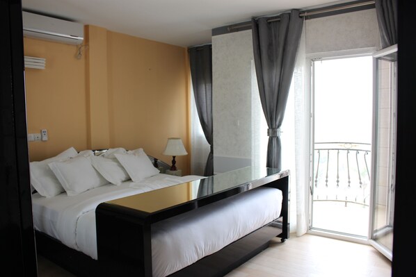 Apartment, 2 Bedrooms | Minibar, in-room safe, desk, blackout curtains - Hôtel Résidence St David (Douala)