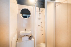 Apartment, 2 Bedrooms | Bathroom | Separate tub and shower, deep soaking tub, hair dryer, bidet