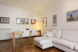 Apartment, 1 Bedroom | Living area | TV