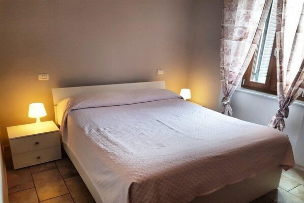 Apartment, 1 Bedroom, Patio | 1 bedroom, cots/infant beds