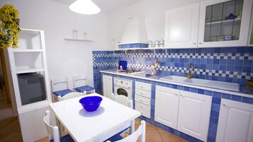 Apartment | Private kitchen | Fridge, oven, stovetop, cookware/dishes/utensils