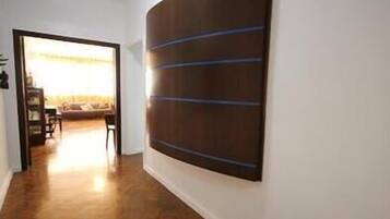 Standard Apartment, 3 Bedrooms | Living area | TV