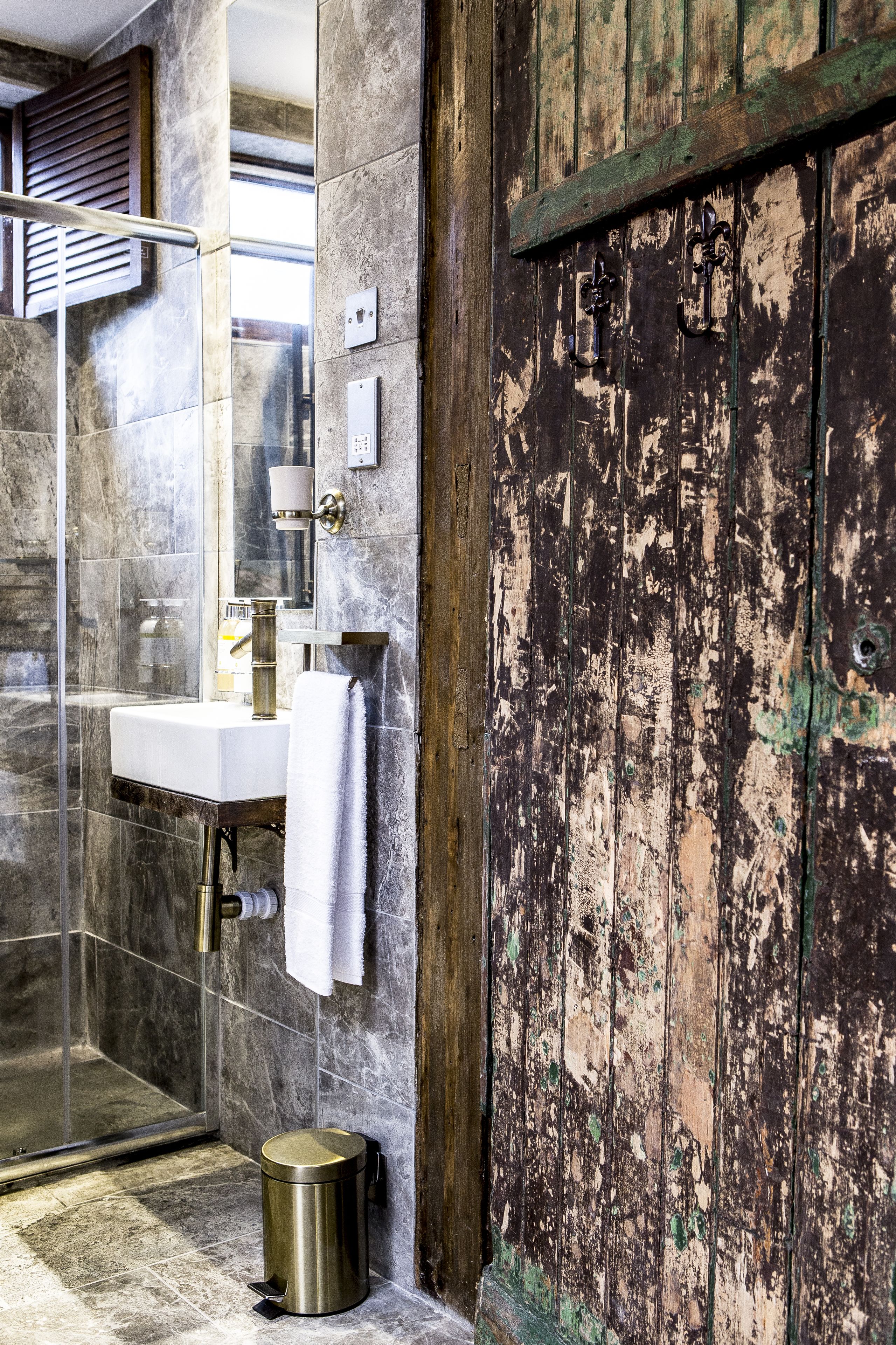 shower, rainfall showerhead, designer toiletries, slippers