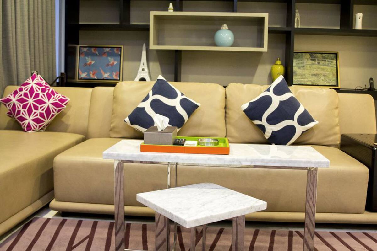 Deluxe Family Suite, 3 Bedrooms | Living room