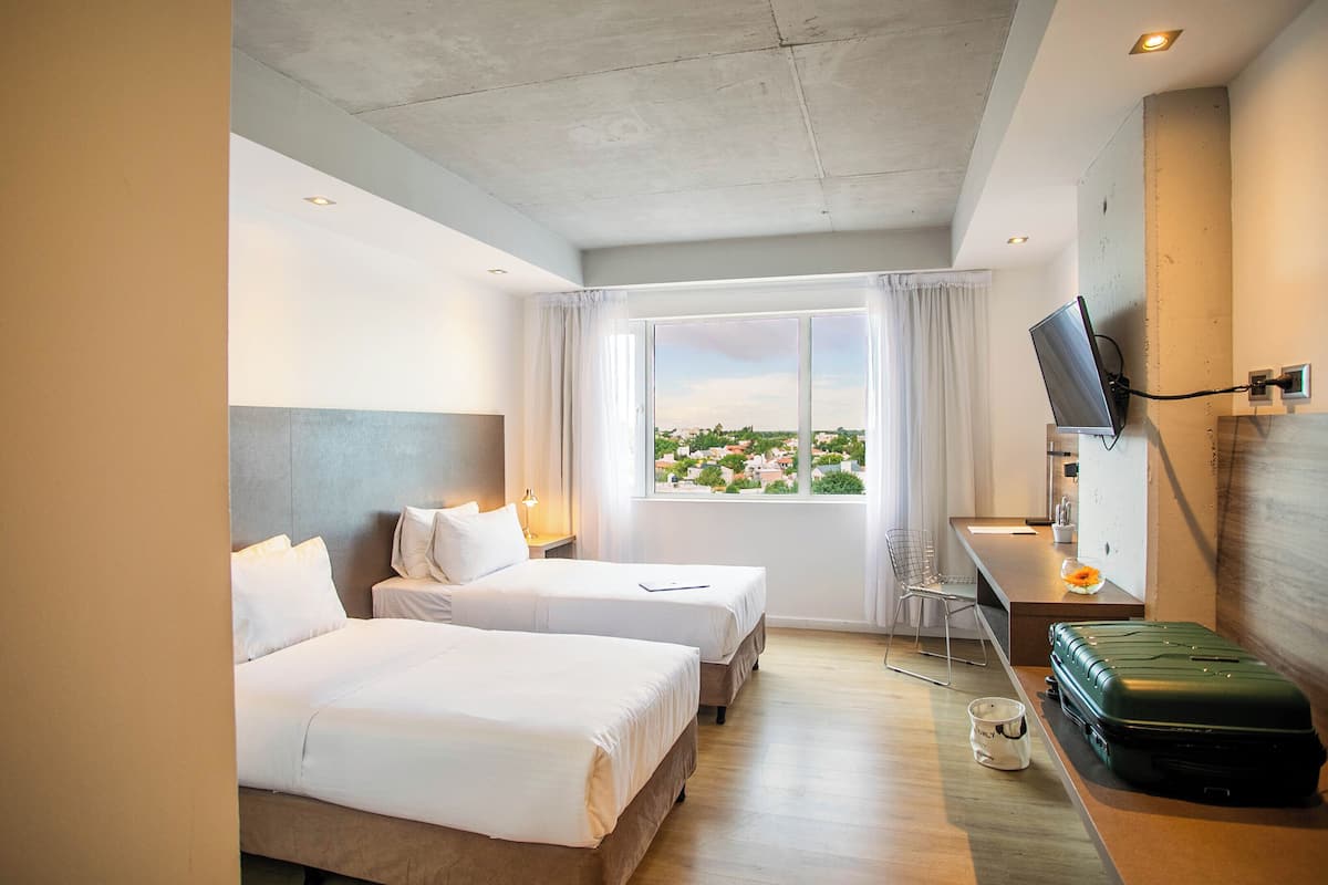 Premium bedding, down comforters, pillowtop beds, minibar