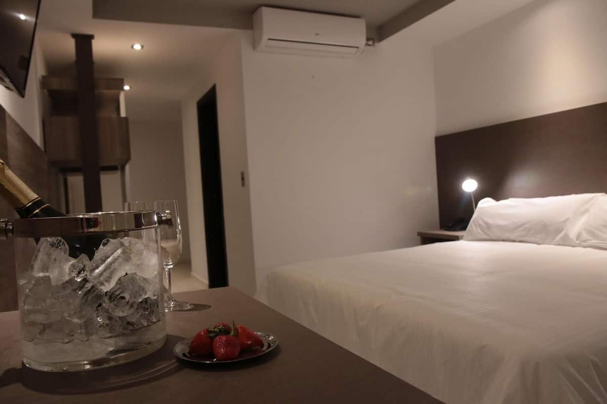 Premium bedding, down comforters, pillowtop beds, minibar
