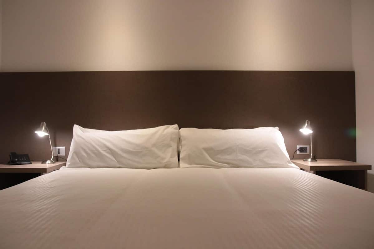 Premium bedding, down comforters, pillowtop beds, minibar