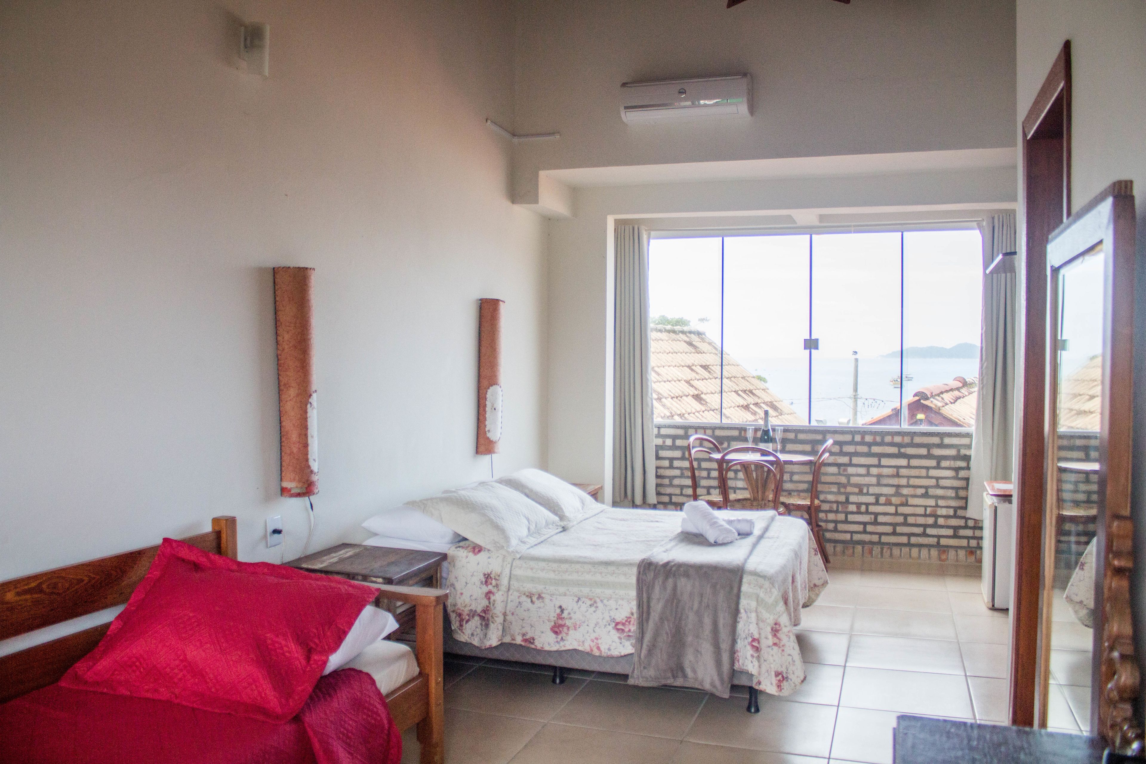 Quarto família | Frigobar, Wi-Fi de cortesia, roupa de cama