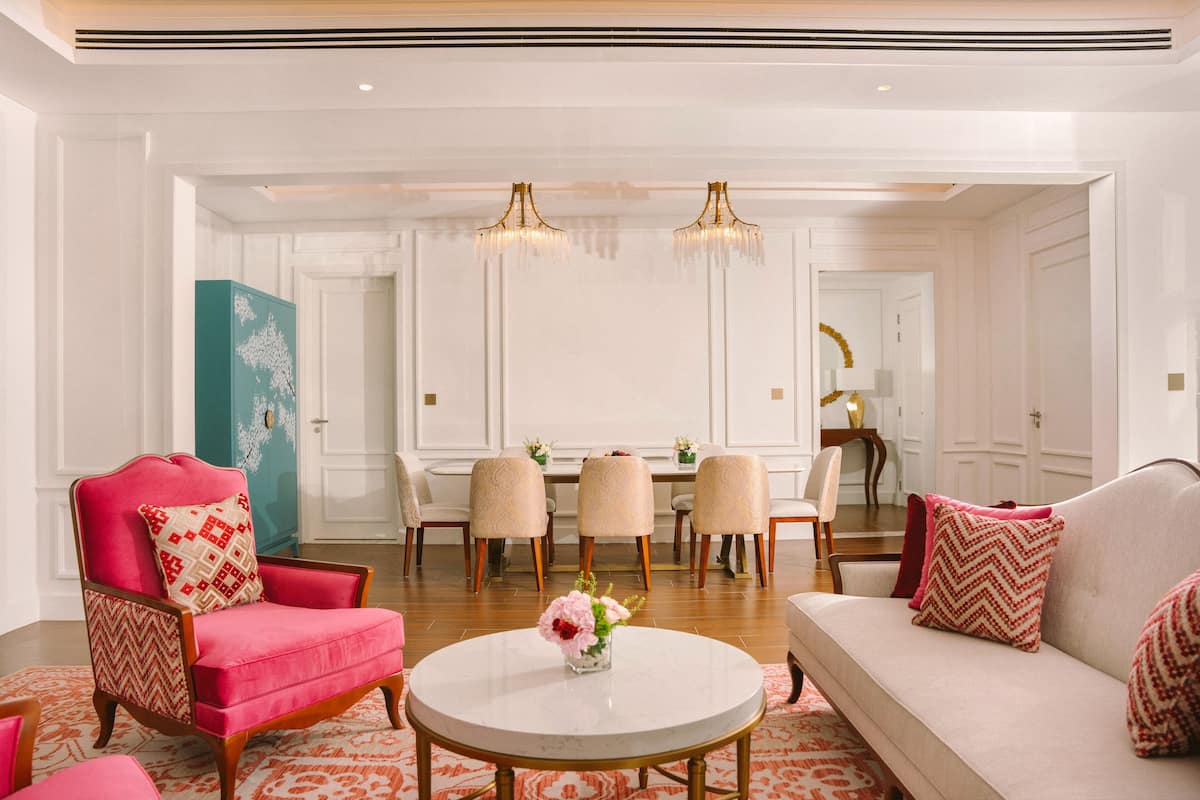 Royal Mansion Suite | Living area | 65-inch LCD TV with cable channels, TV, fireplace