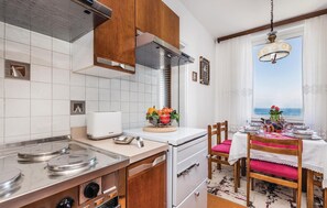 Fridge, stovetop, coffee/tea maker
