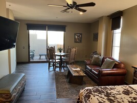 Purple Room | Living area | 60-inch flat-screen TV with cable channels, TV, first-run movies