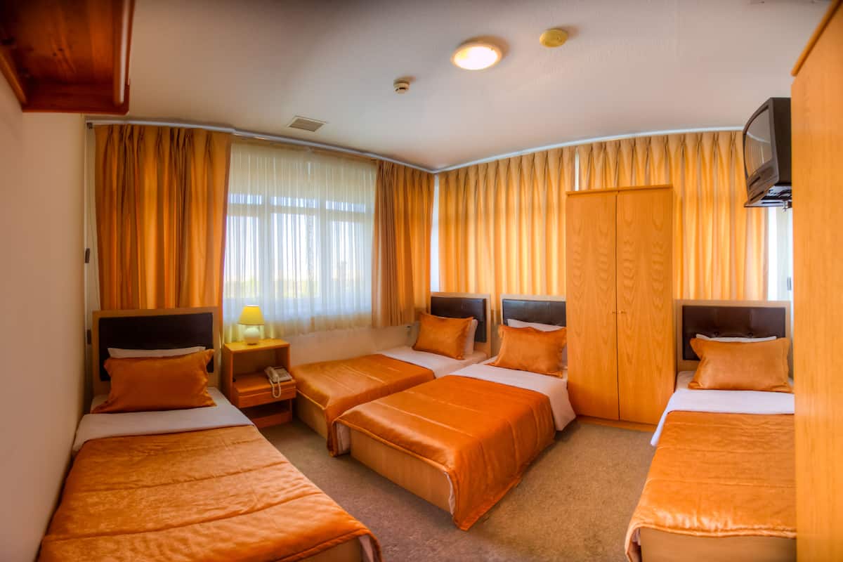 Standard Quadruple Room | Premium bedding, in-room safe, desk, soundproofing