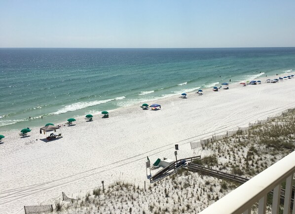 On the beach, sun-loungers