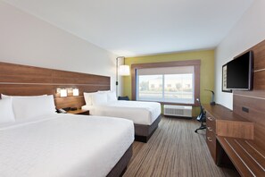A hotel room with two beds, a TV, a desk, and a window with a view. - Holiday Inn Express & Suites Moses Lake by IHG (Moses Lake)