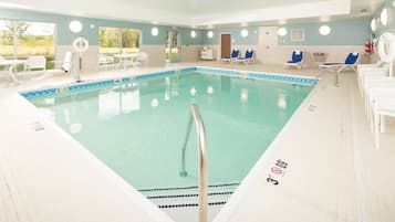 Indoor pool, open 7:00 AM to 11:00 PM, pool loungers