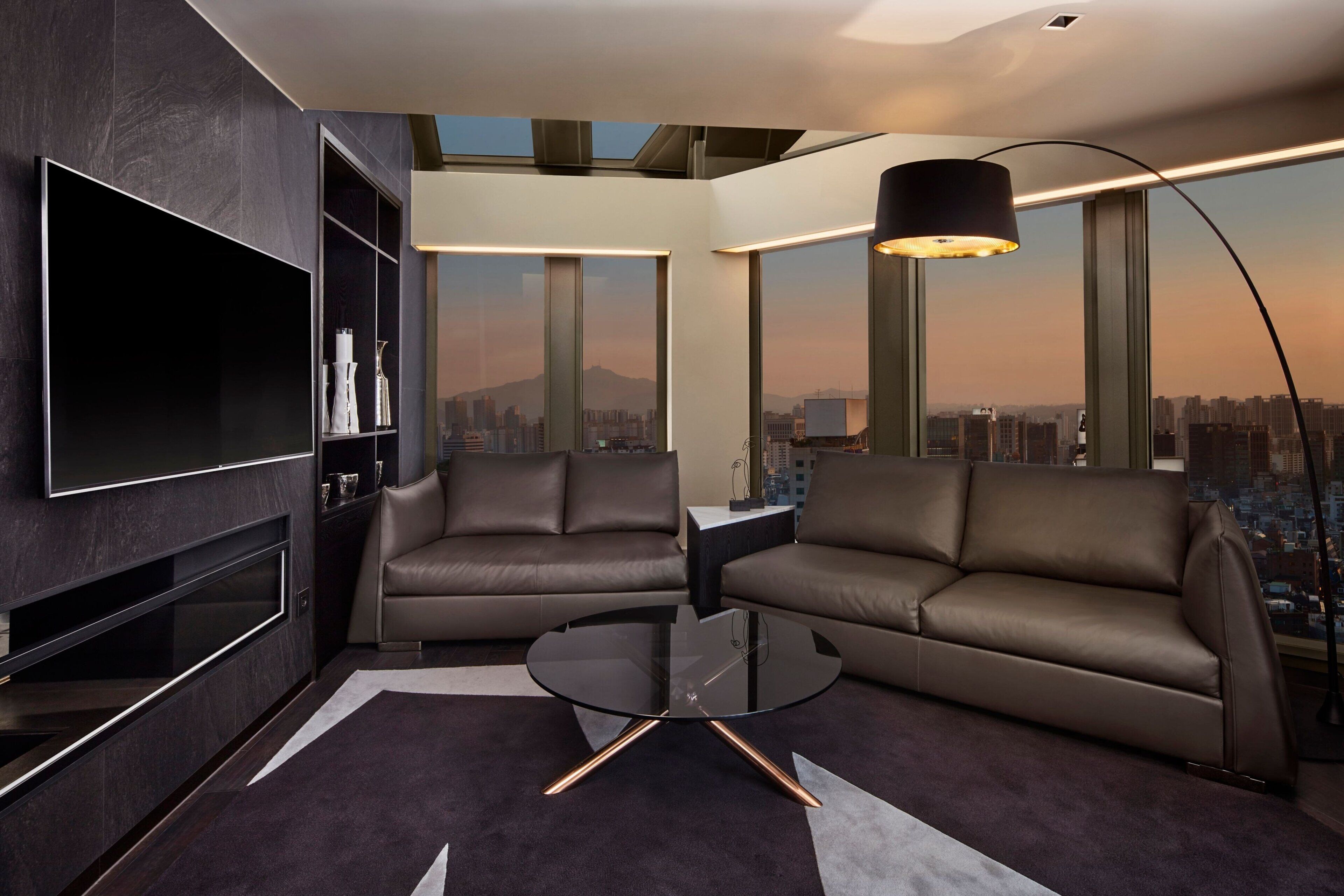 penthouse, 1 king bed, non smoking, city view (balcony) | living room | lcd tv