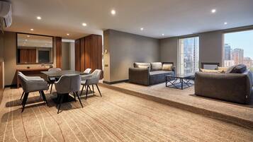 Skyloft Superior Two-Bedroom Suite | Living area | 40-inch LED TV with cable channels, TV, MP3 dock