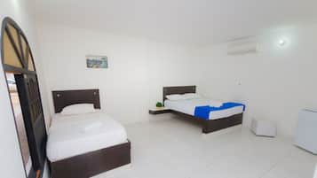 Standard Triple Room | Minibar, in-room safe, free WiFi, bed sheets