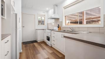 Microwave, electric kettle, dining tables