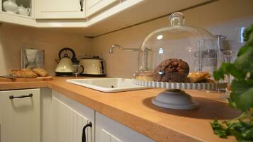 Oven, freezer, dining tables