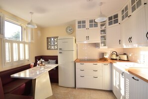 Oven, freezer, dining tables