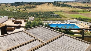A rooftop pool area with a view of the countryside. - Carabollace Estate - Mistral (Sciacca)