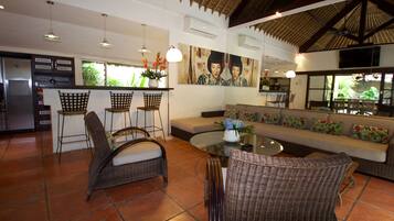 Deluxe Villa, 4 Bedrooms, Poolside | Living area | Flat-screen TV, DVD player