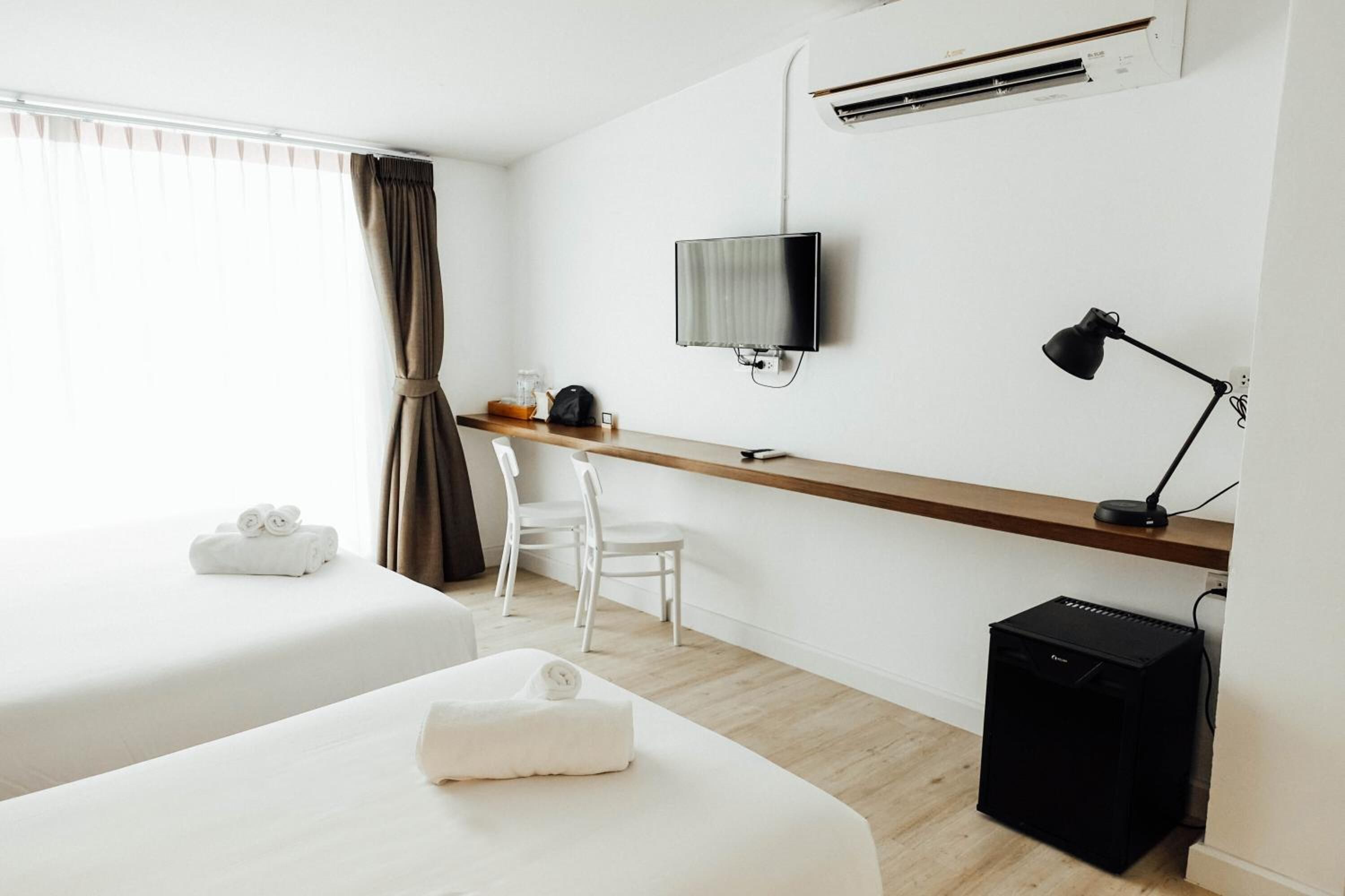 premium bedding, select comfort beds, minibar, in-room safe