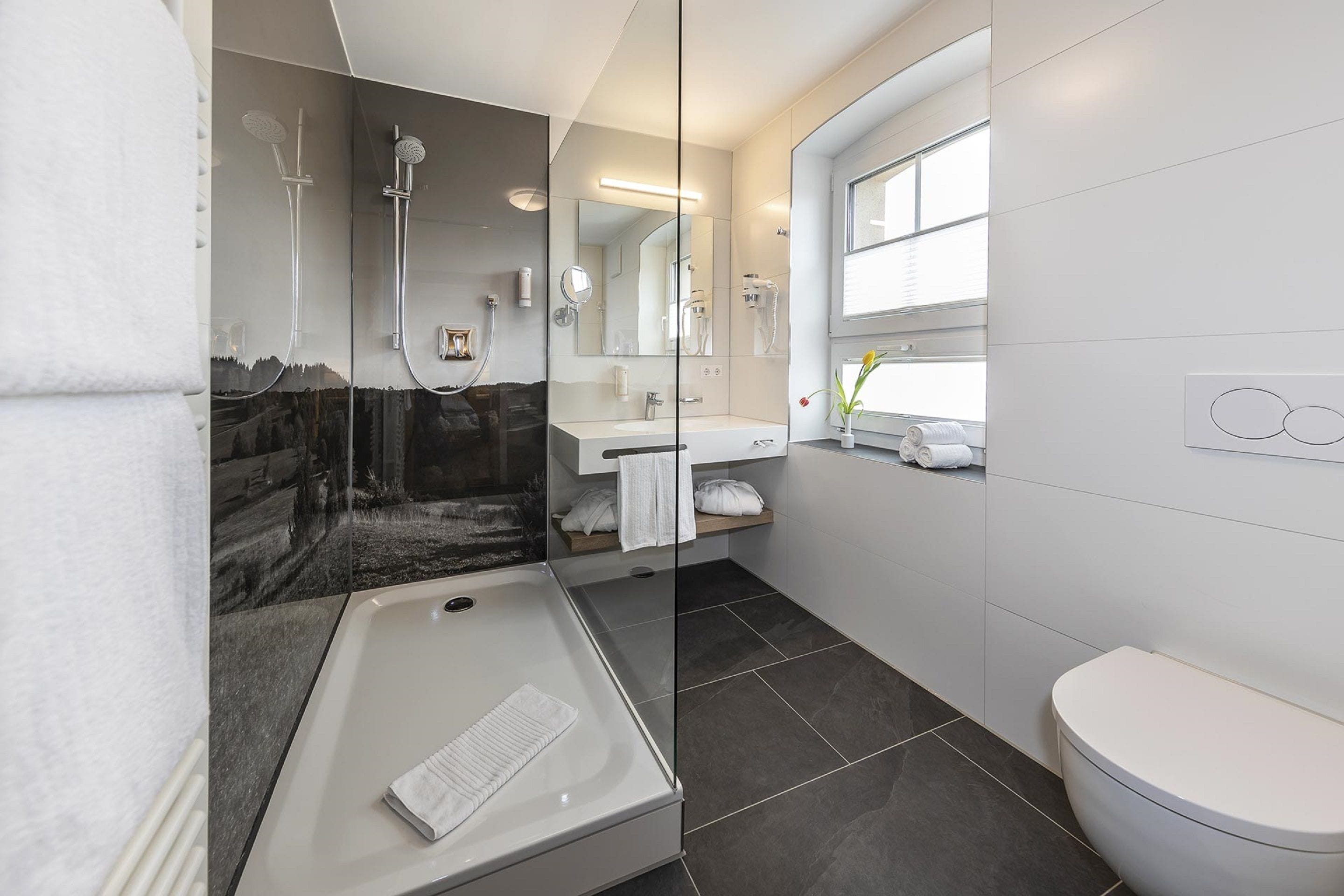 shower, hair dryer, bathrobes, towels