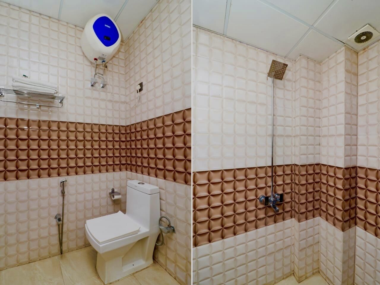 A bathroom with a toilet, a shower, and a hand dryer.