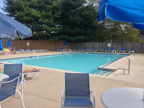 Beautiful tranquil setting with pool or walk to the beach, shopping and dining.