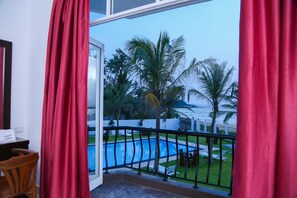 Suite superior, varias camas, balcón | Balcón