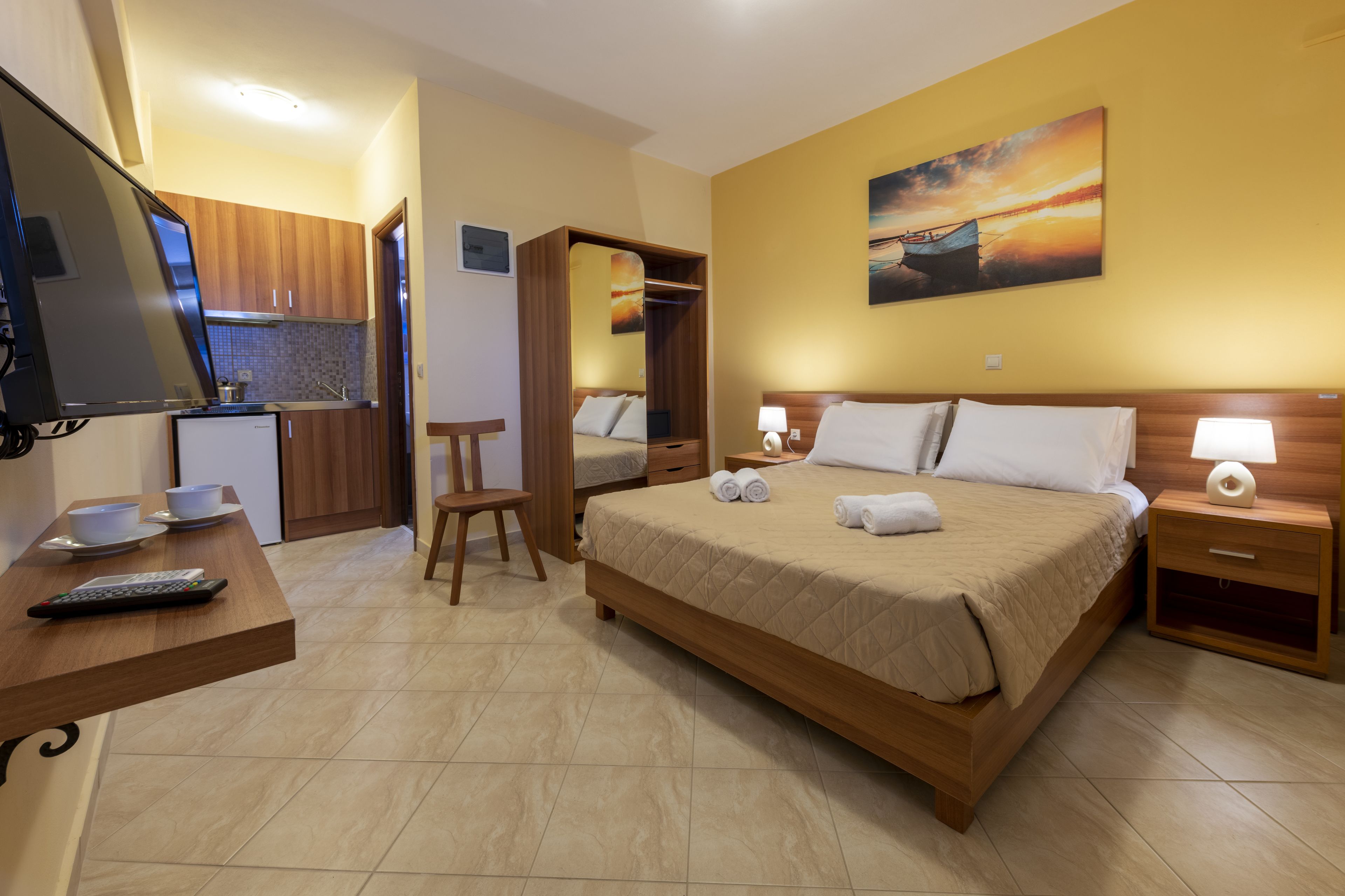 Habitació clàssica | Cuina privada | Frigorífic, placa de cuina, cafetera i tetera i bullidora elèctrica 