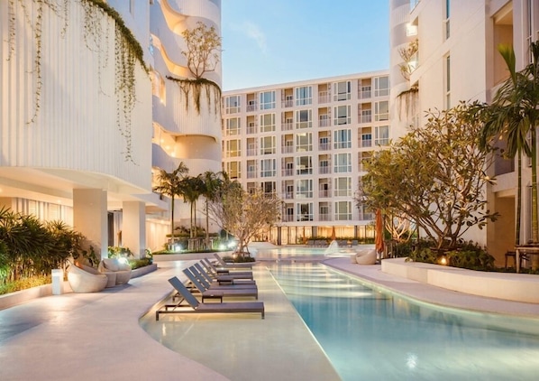 Outdoor pool - The Base Downtown Condo by Joy (Wichit)