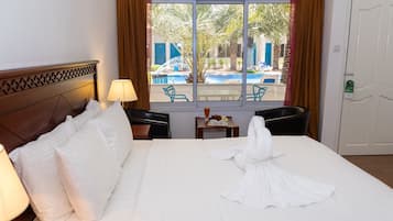 Deluxe Double Room, 1 Bedroom, Pool View | Iron/ironing board, free WiFi, bed sheets