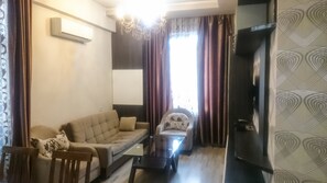 アパートメント 2 ベッドルーム | リビング エリア | 薄型テレビ