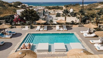 Outdoor pool, open 8:00 AM to 8:00 PM, pool umbrellas, sun loungers