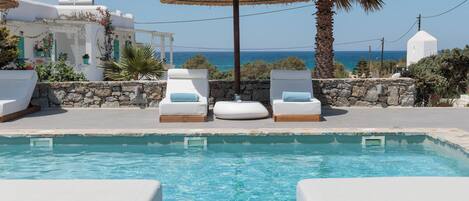 Outdoor pool, pool umbrellas, pool loungers