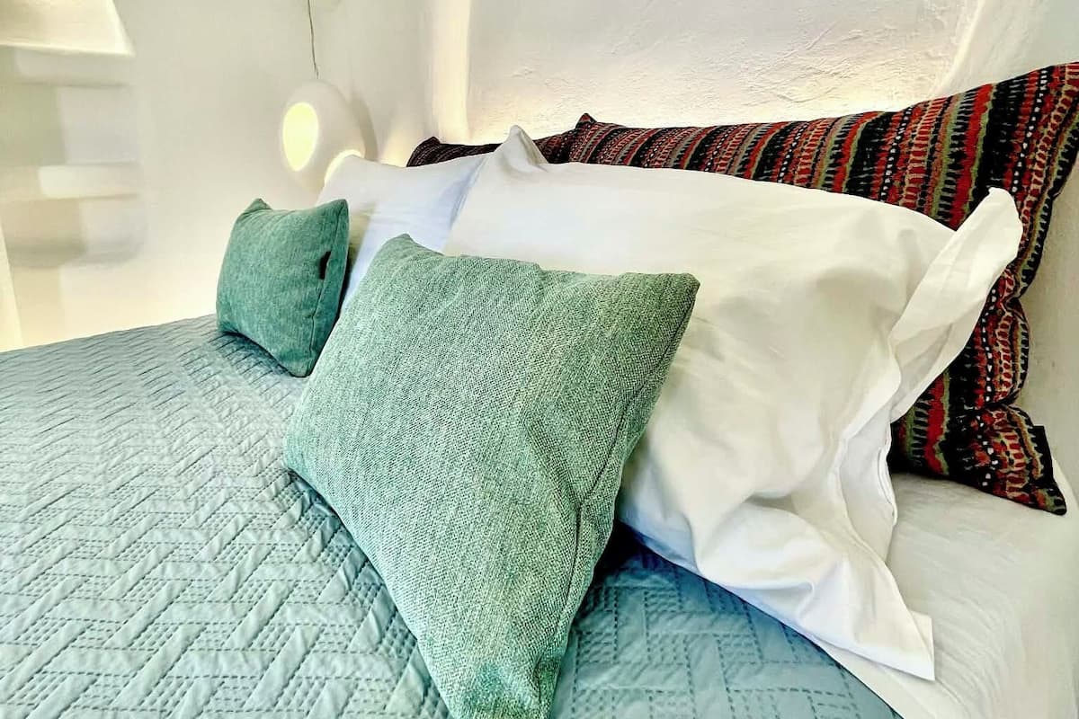 Petra Cave Retreat | Egyptian cotton sheets, premium bedding, memory foam beds
