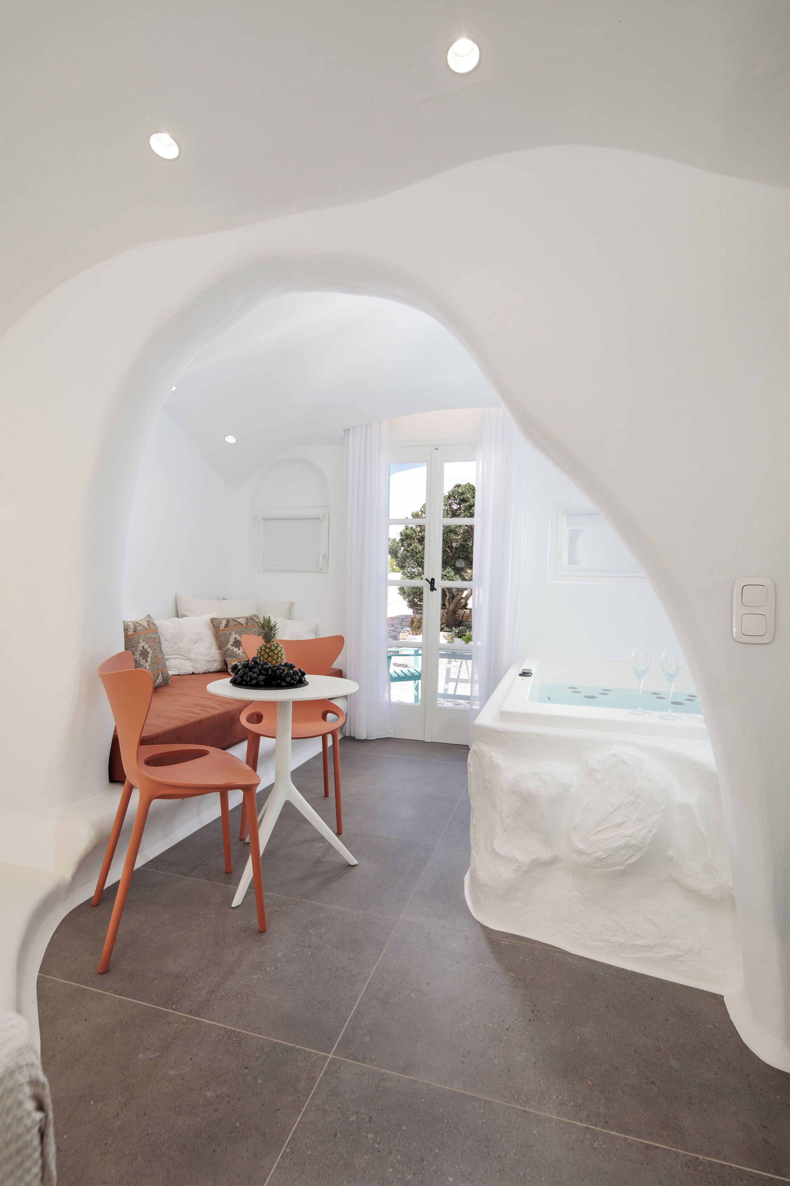 Gaia Naxia Cave suite with indoor mini pool tub | Living area