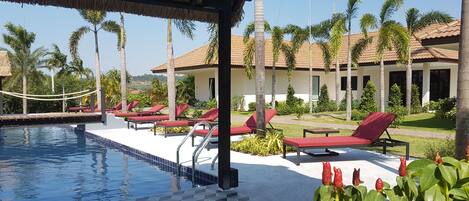 Outdoor pool, pool umbrellas, sun loungers