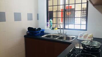 Duplex, 3 Bedrooms | Private kitchen | Full-sized fridge, stovetop, electric kettle, cookware/dishes/utensils