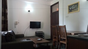 32-inch flat-screen TV with premium TV channels, TV