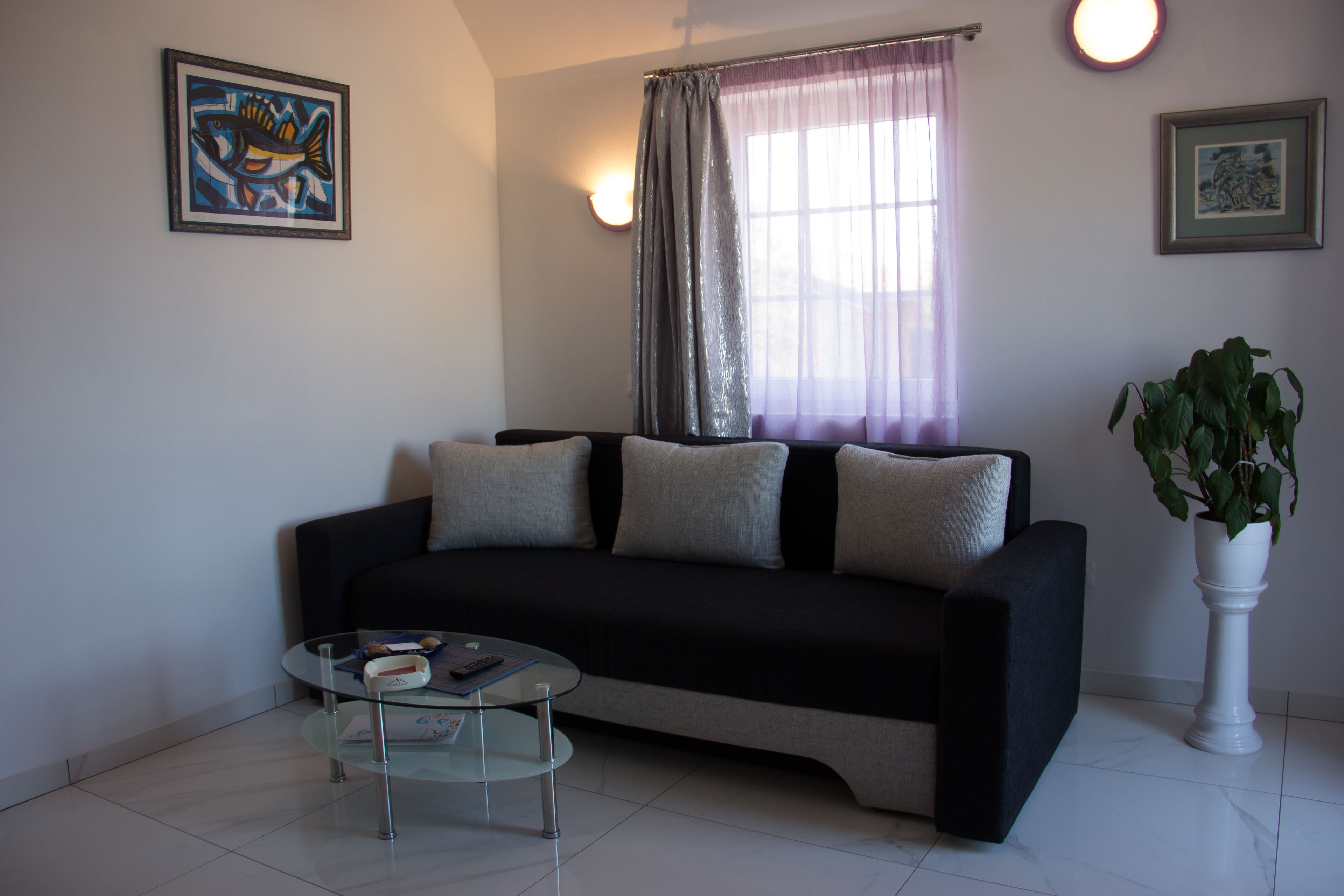 Comfort appartement, uitzicht op zee | Woonruimte | Een flatscreentelevisie